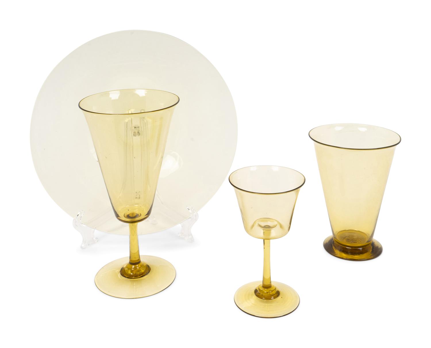 An Unsigned Steuben Amber Glass Part Stemware Service — 20TH CENTURY