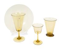 An Unsigned Steuben Amber Glass Part Stemware Service — 20TH CENTURY