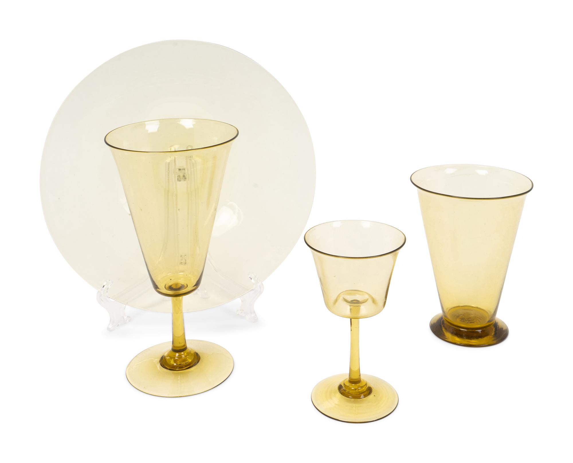 An Unsigned Steuben Amber Glass Part Stemware Service — 20TH CENTURY