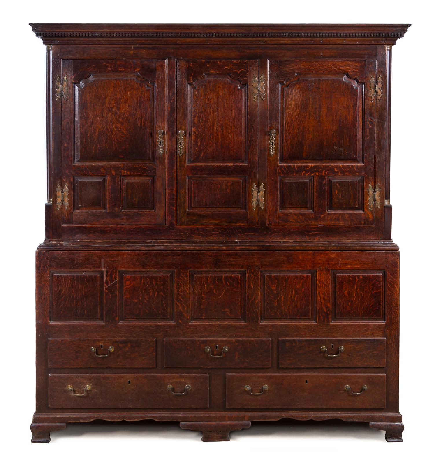 An English Oak Linen Press Height 81 1/2 x width 74 x depth 23 inches. — 19TH CENTURY