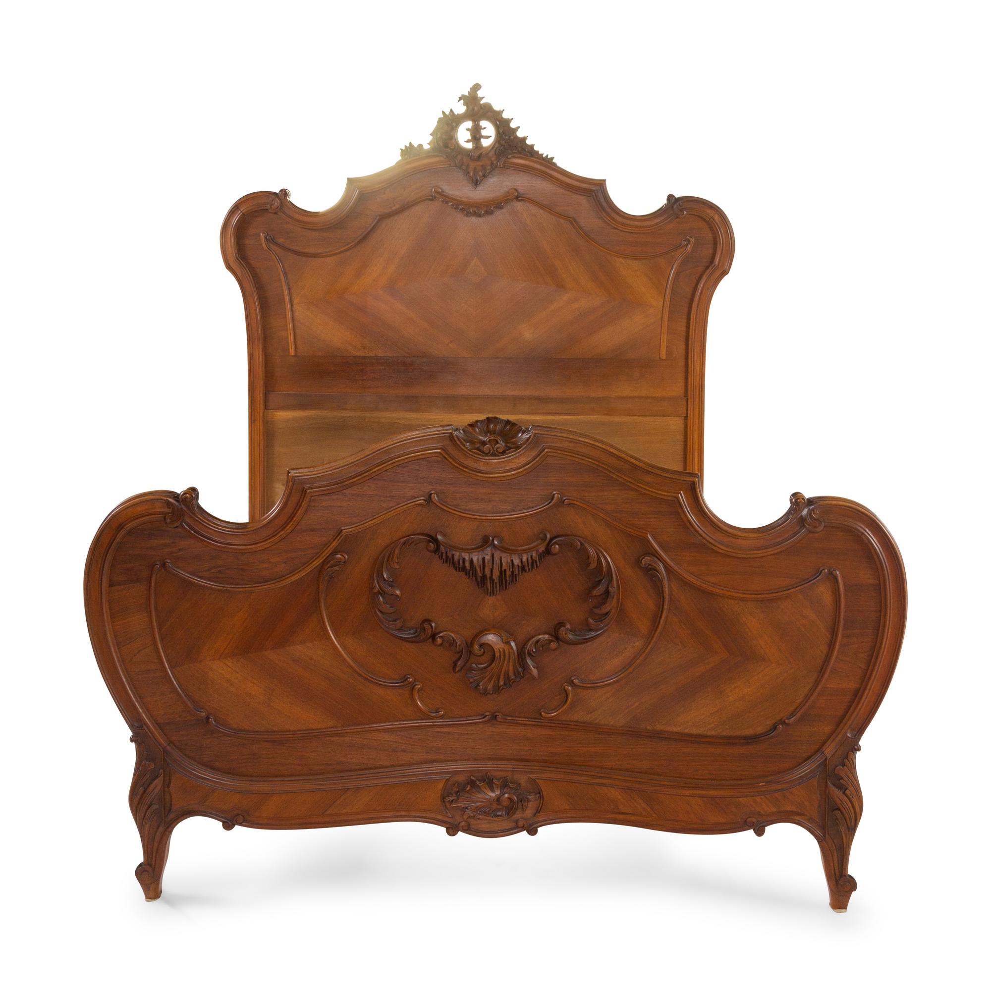 A Louis XV Style Walnut Bed