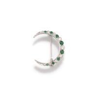 DIAMOND AND EMERALD CRESCENT BROOCH