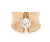 A 14 Karat Yellow Gold and Diamond Ring,