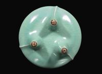 A celadon-glazed tripod censer 青瓷三足香爐