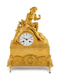 A French Empire Style Gilt Bronze Clock — 19TH CENTURY