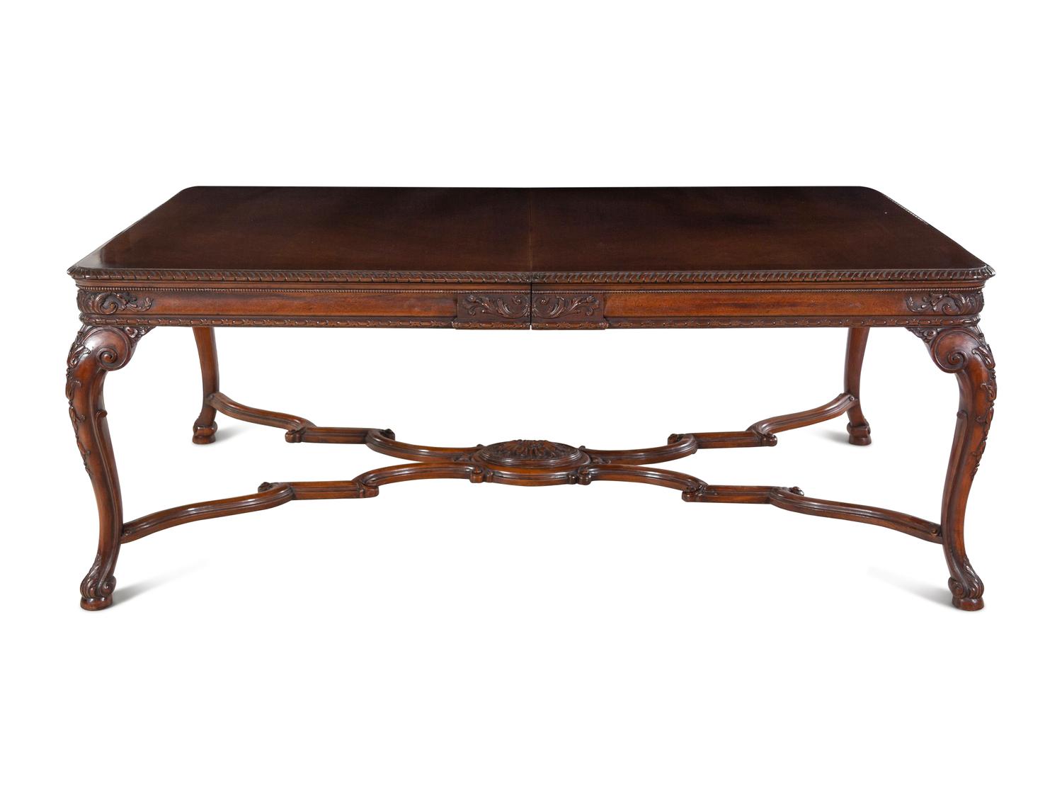 A George II Style Walnut Dining Table