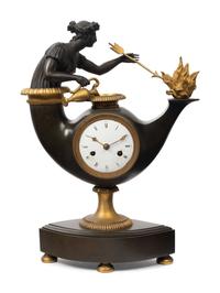 A French Neoclassical Gilt and Patinated Bronze "Oil Lamp" Clock