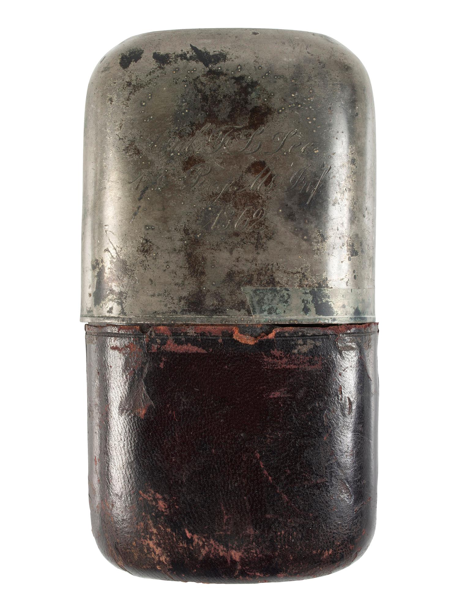 [CIVIL WAR]. Pewter, leather, and glass whiskey flask with engraved identification.