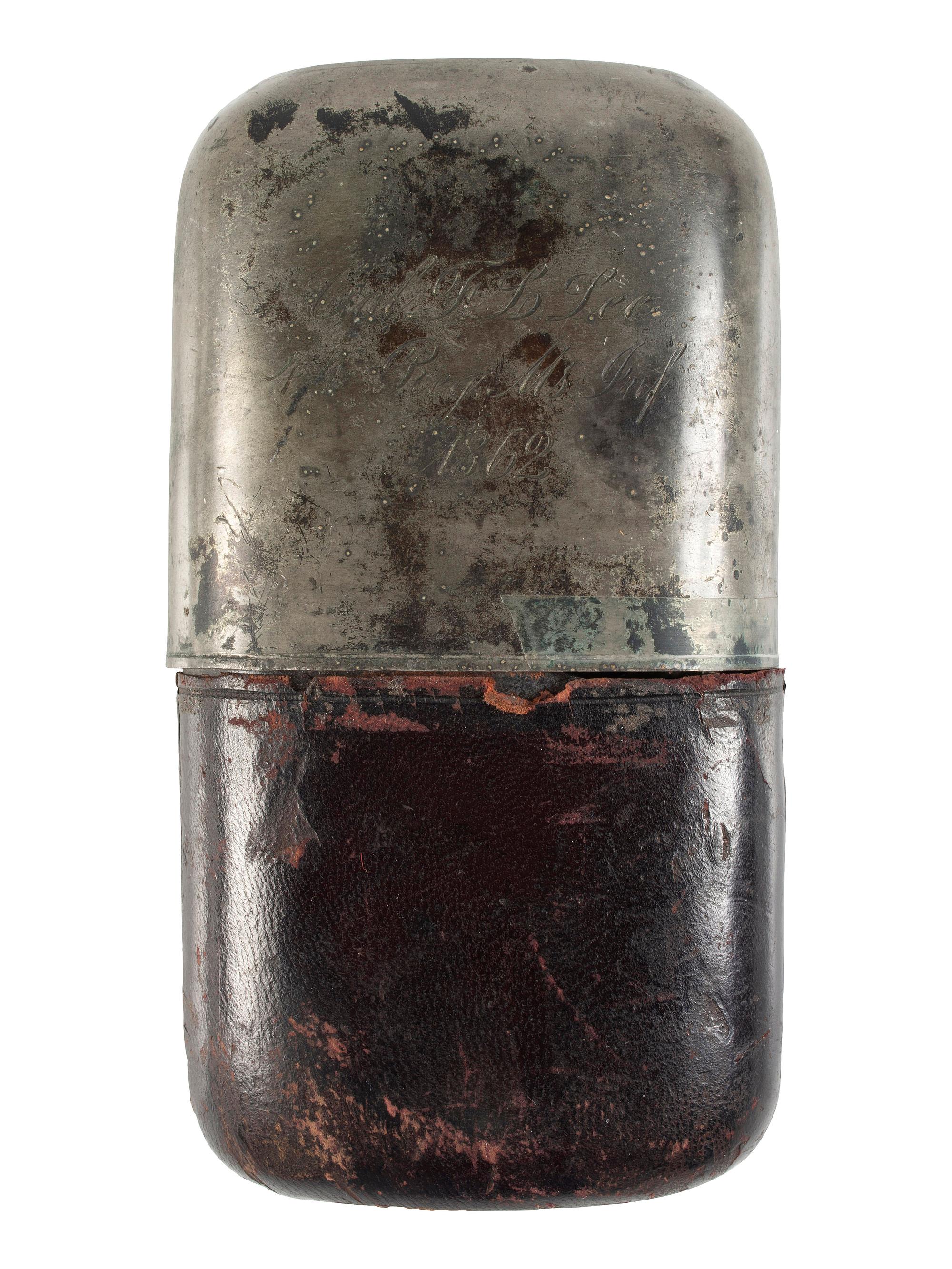 [CIVIL WAR]. Pewter, leather, and glass whiskey flask with engraved identification.