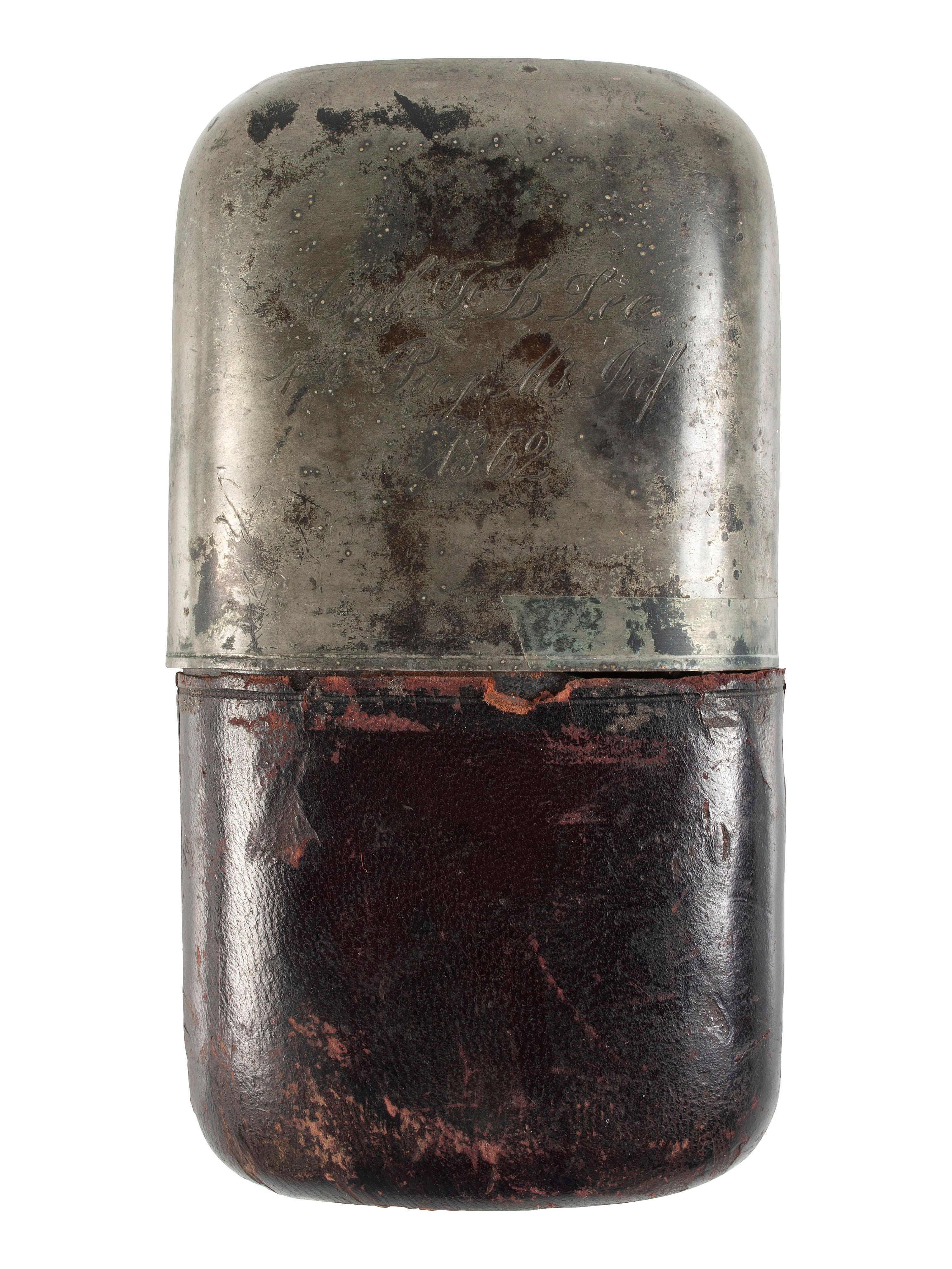 [CIVIL WAR]. Pewter, leather, and glass whiskey flask with engraved identification.