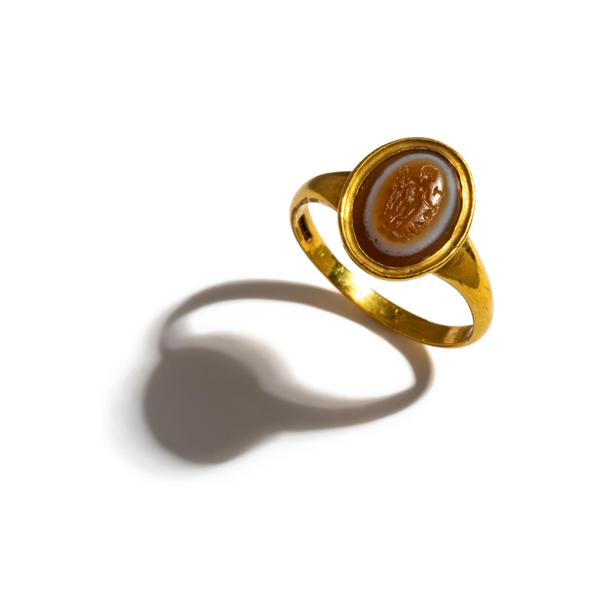 A Roman Banded-Agate Ring Stone with the God Mercury — Set in a gold ring