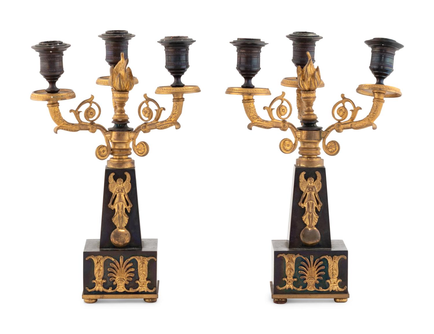 A Pair of Empire Style Gilt and Patinated Bronze Three-Light Candelabra