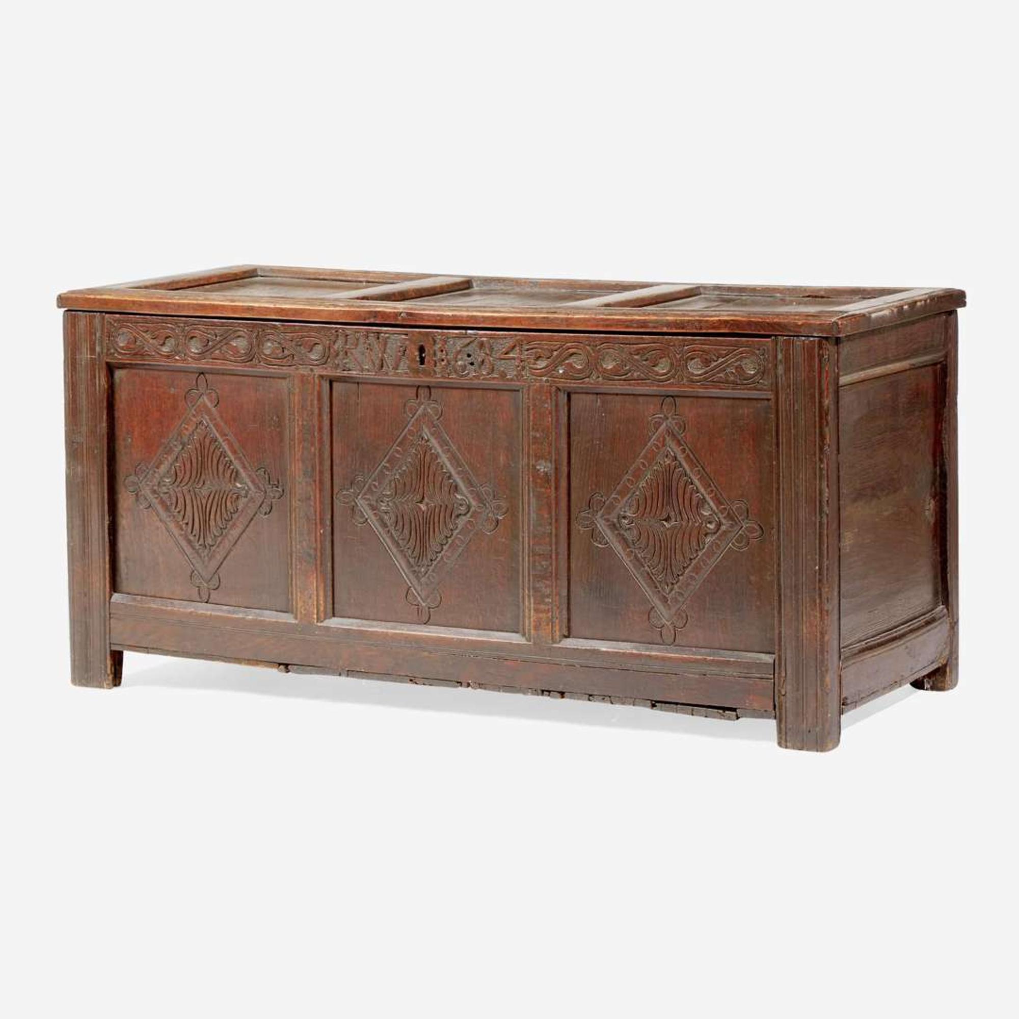 A James II carved oak coffer, dated "1684"