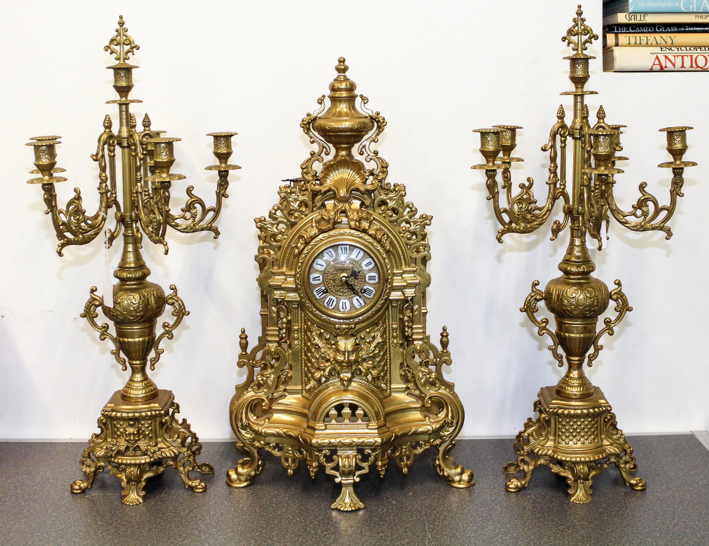 A Continental Gilt Metal Clock Garniture, Imperial Height of clock 24 inches. — 20TH CENTURY