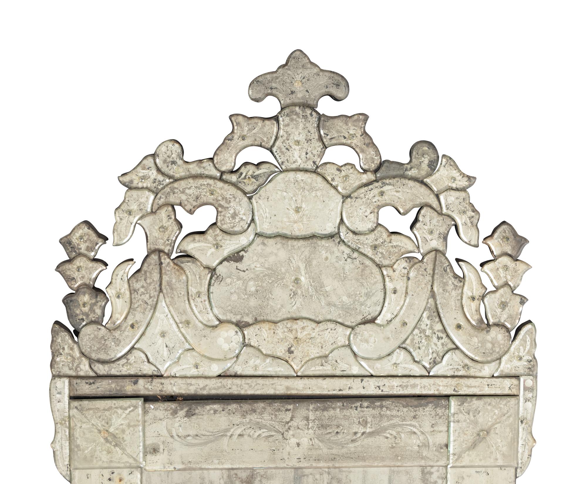 A Pair of Venetian Style Mirror-Veneered Console Tables and Mirrors