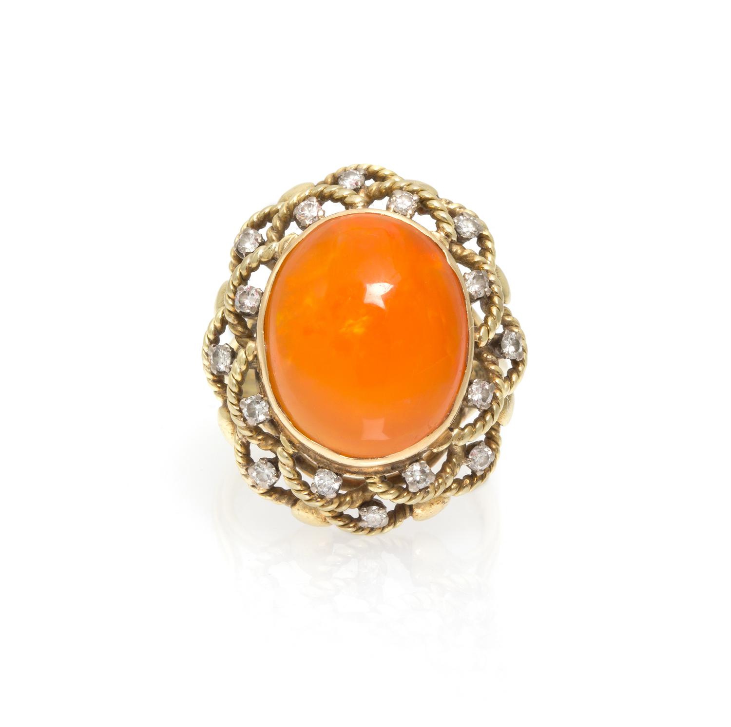 A 14 Karat Yellow Gold, Fire Opal and Diamond Ring, 7.60 dwts.