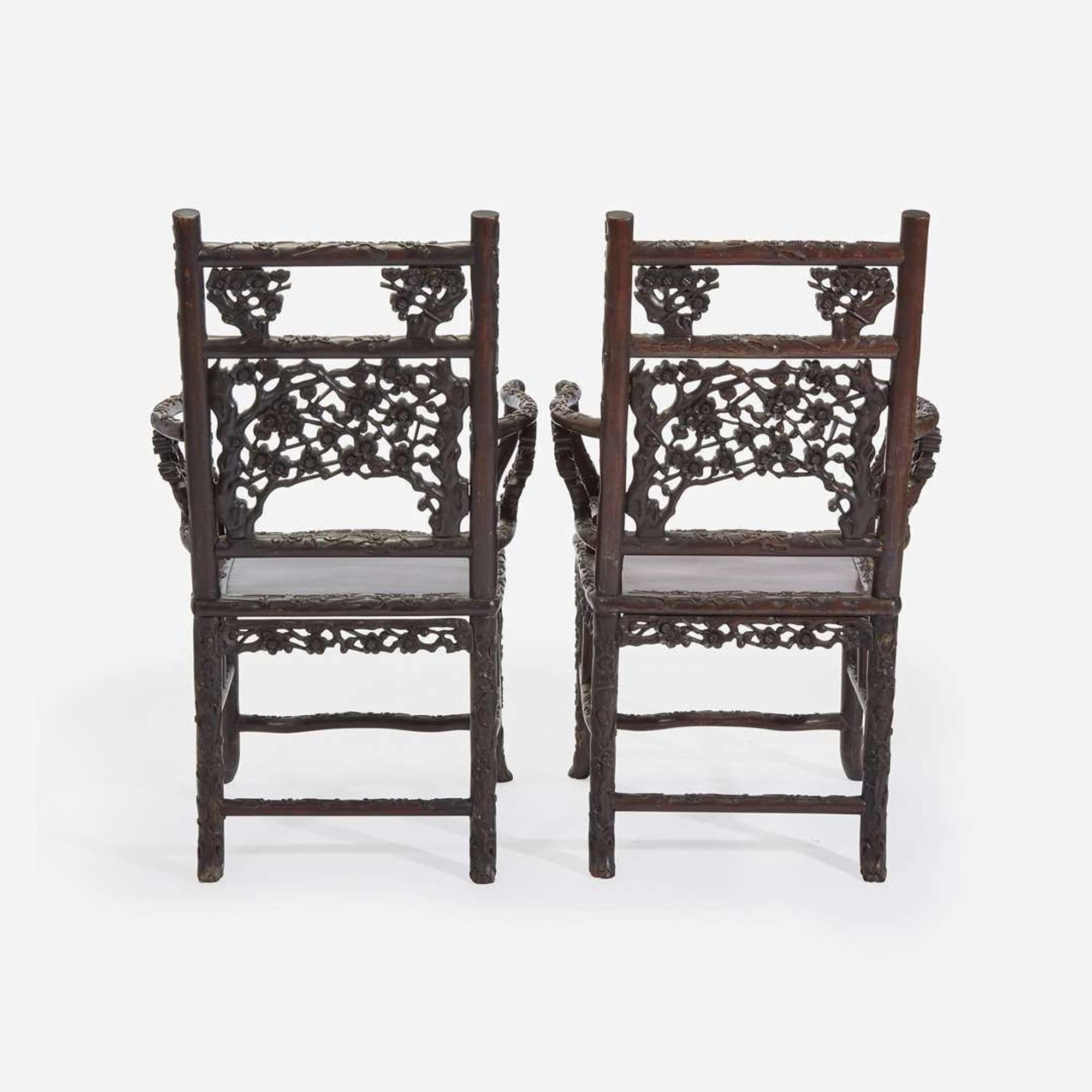 An unusual pair of Chinese carved hardwood armchairs 中国硬木扶手椅一对 Late 19th to early 20th Century ?????????????
