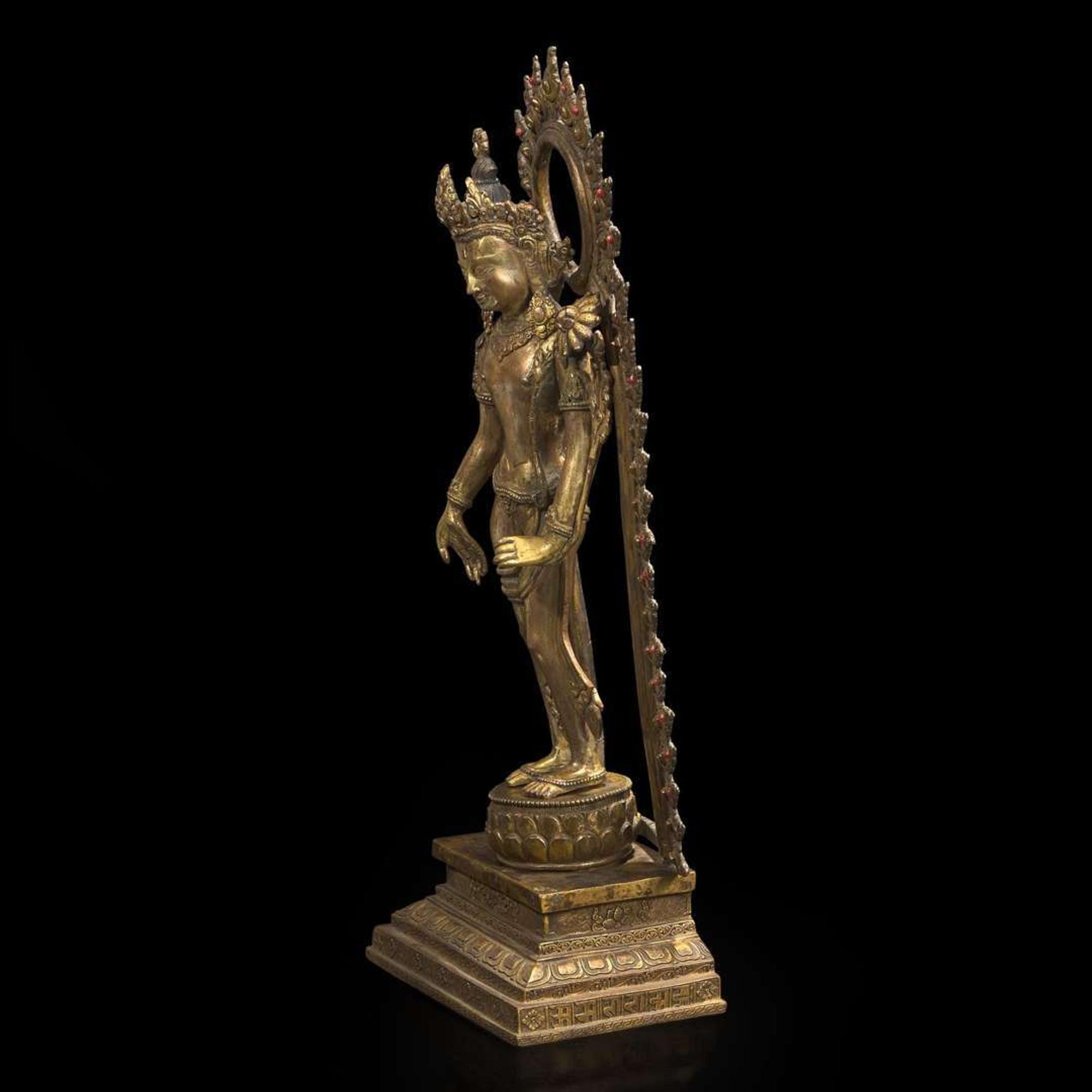 A Sino-Tibetan or Nepalese gilt bronze figure of Padmapani 藏传或尼泊尔铜鎏金圣观世音造像 19th century ????
