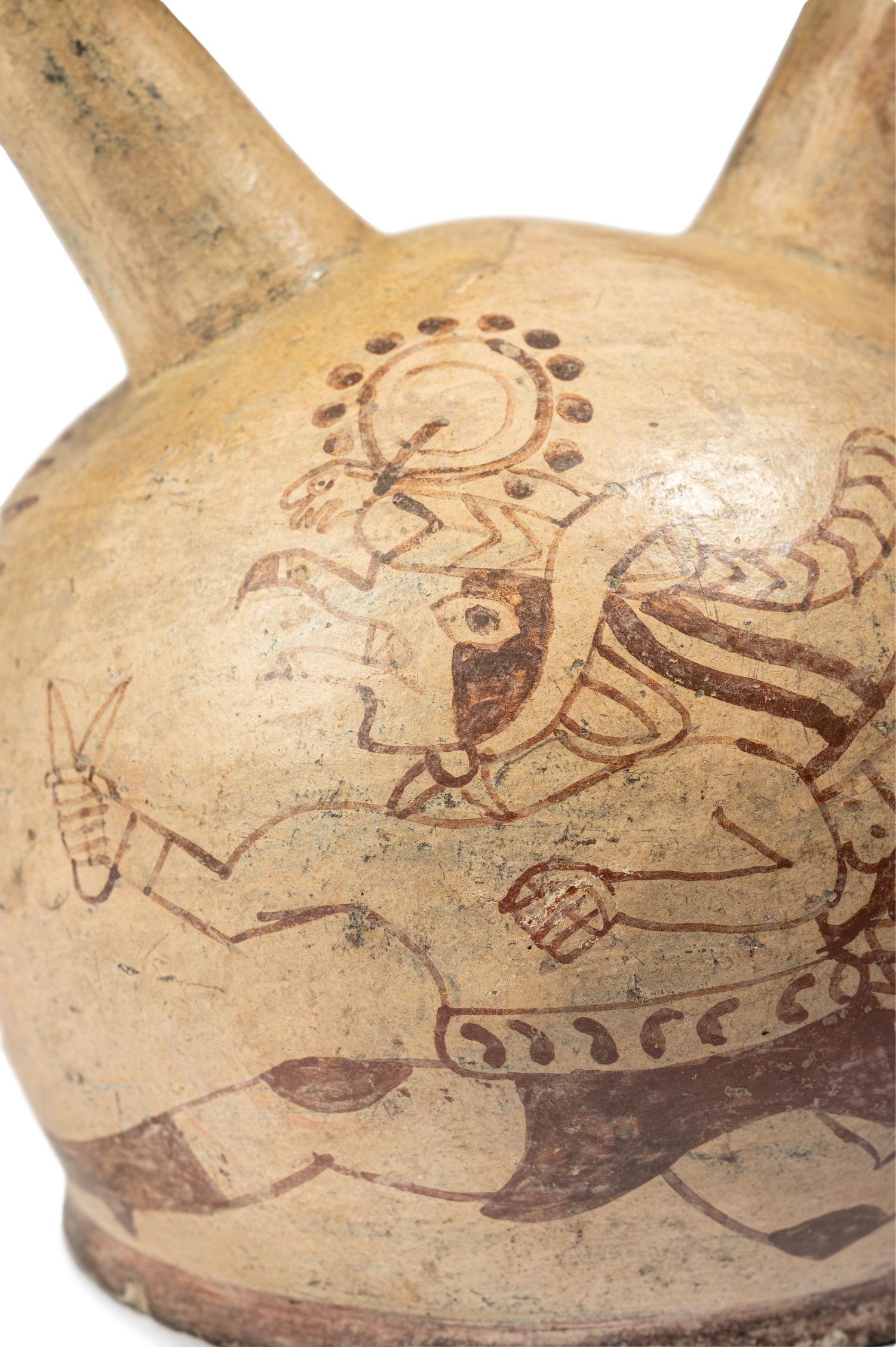 A Moche Fineline Stirrup Vessel
