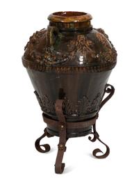 Italian Brown Glazed Ceramic Amphora in an Iron Stand