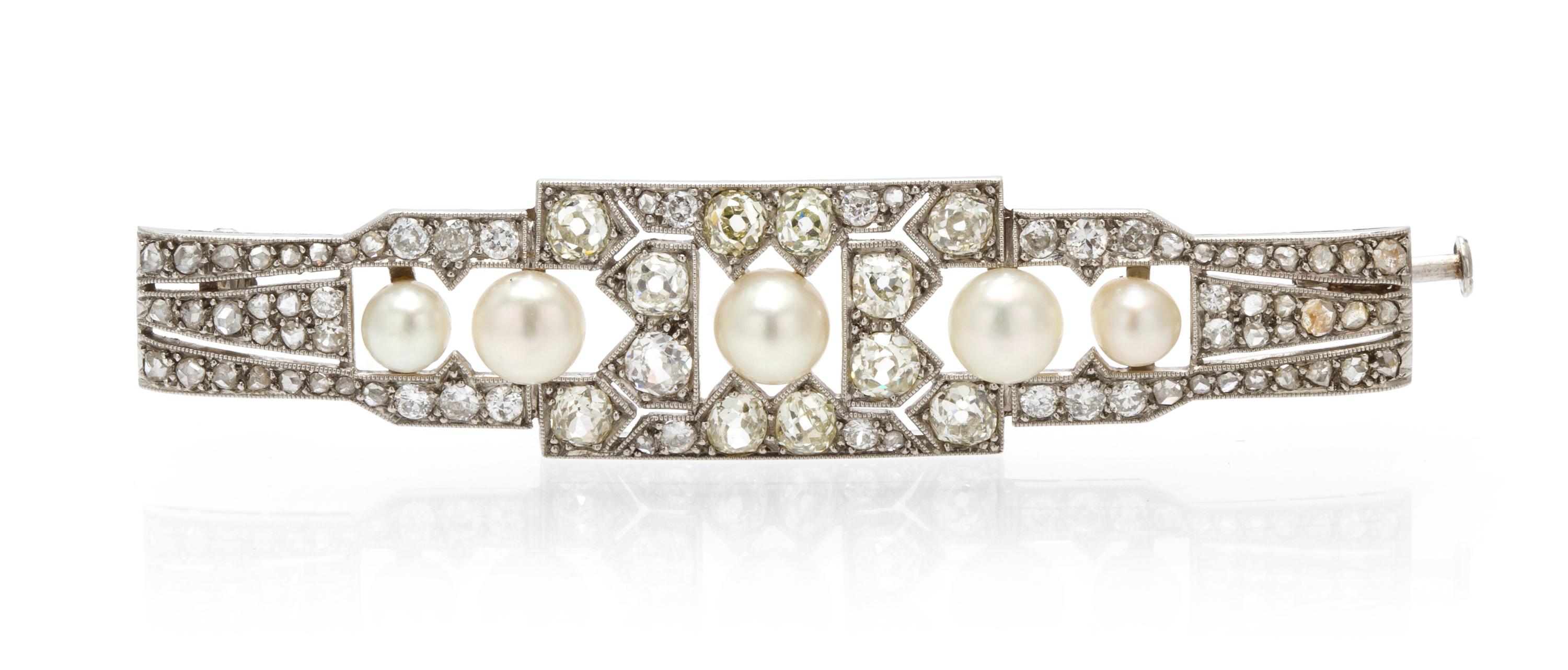 An Art Deco Platinum, Diamond and Natural Pearl Bar Brooch, 8.80 dwts.