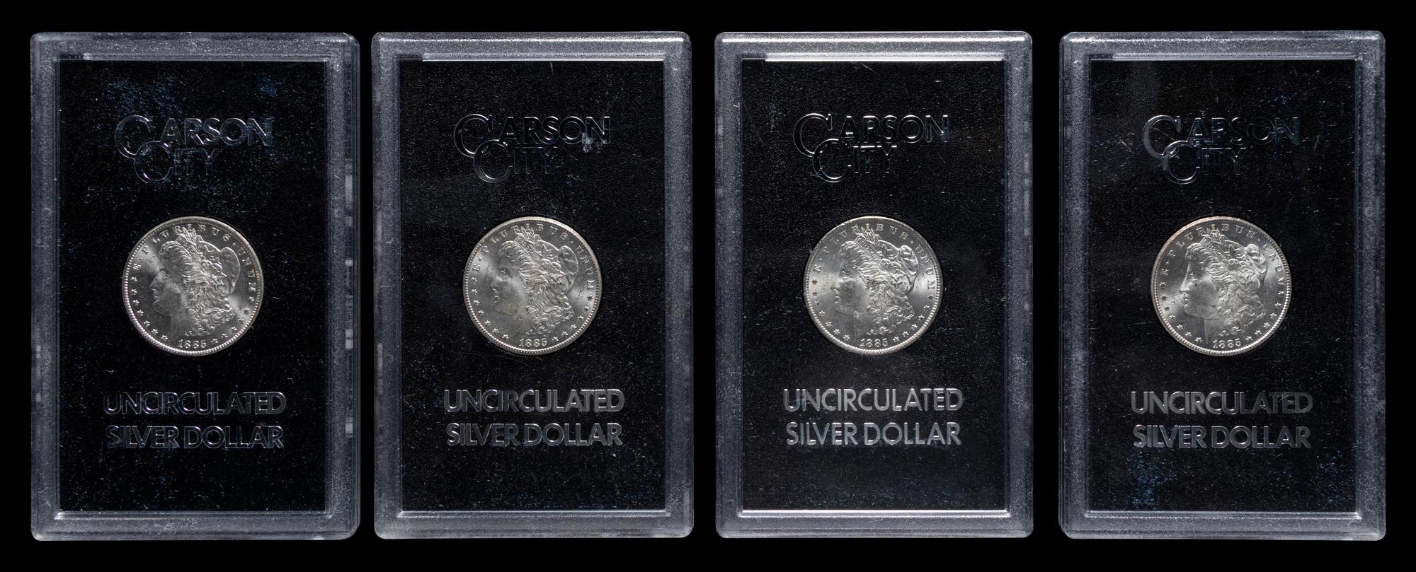 A Group of Ten 1885-CC GSA: Morgan $1 Coins