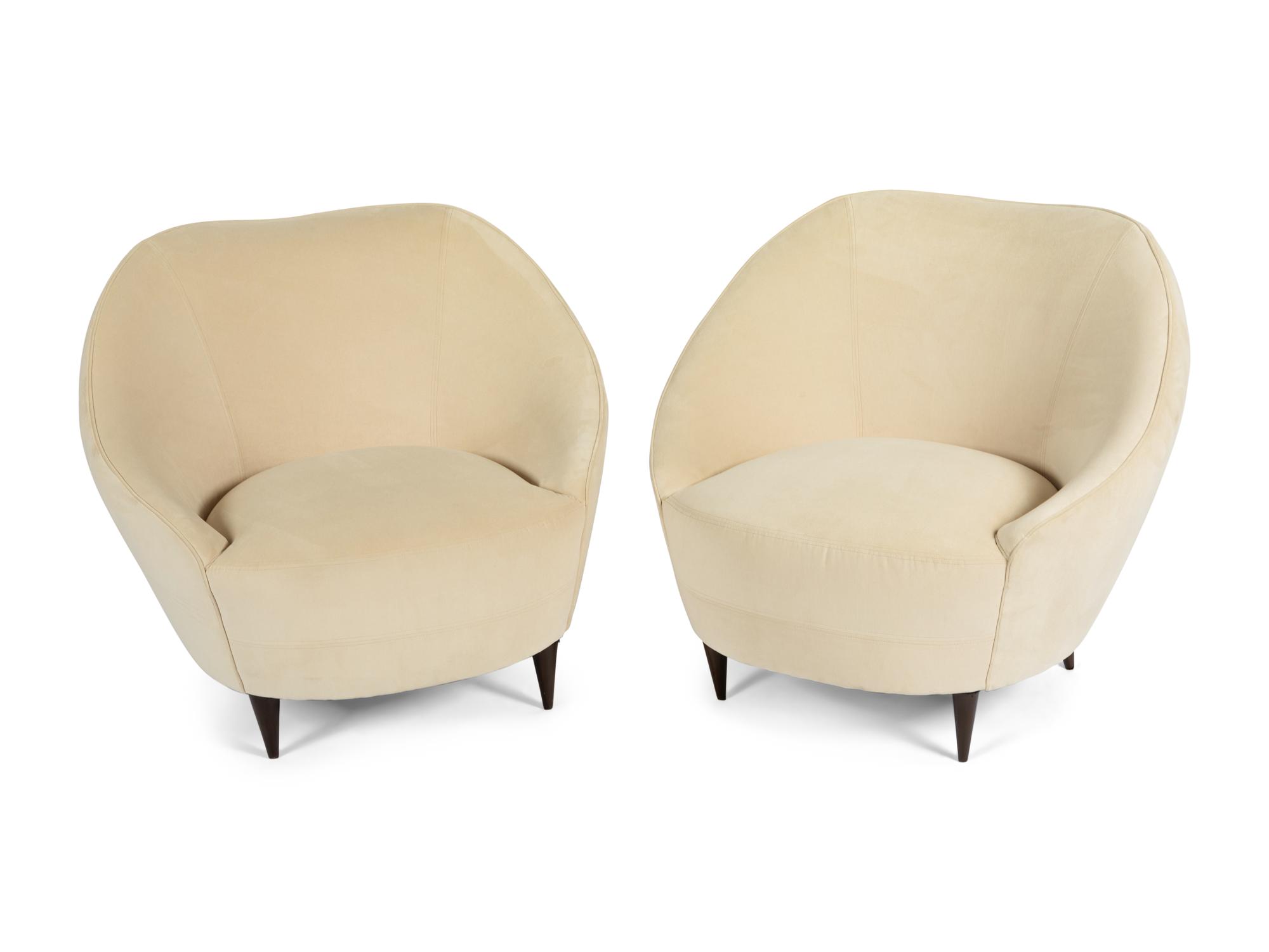 A Pair of Gondola Upholstered Lounge Chairs