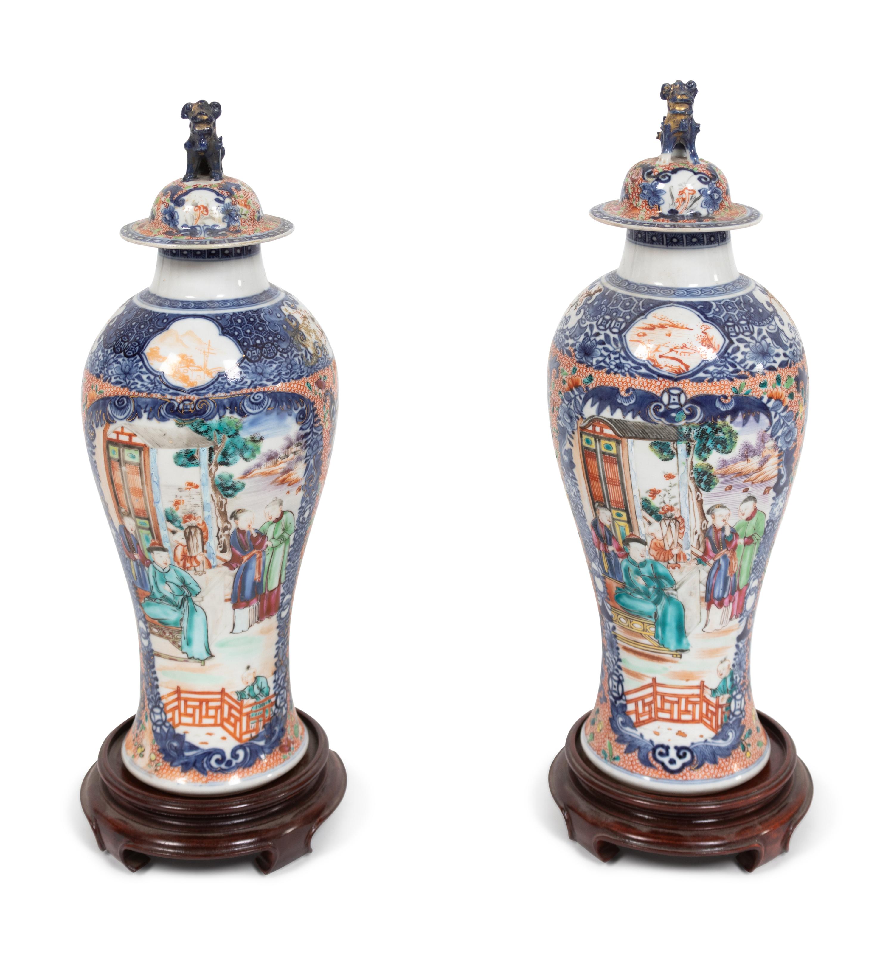 A Pair of Chinese Export Mandarin Palette Vases and Covers