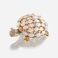 An opal, diamond, emerald, and fourteen karat gold brooch