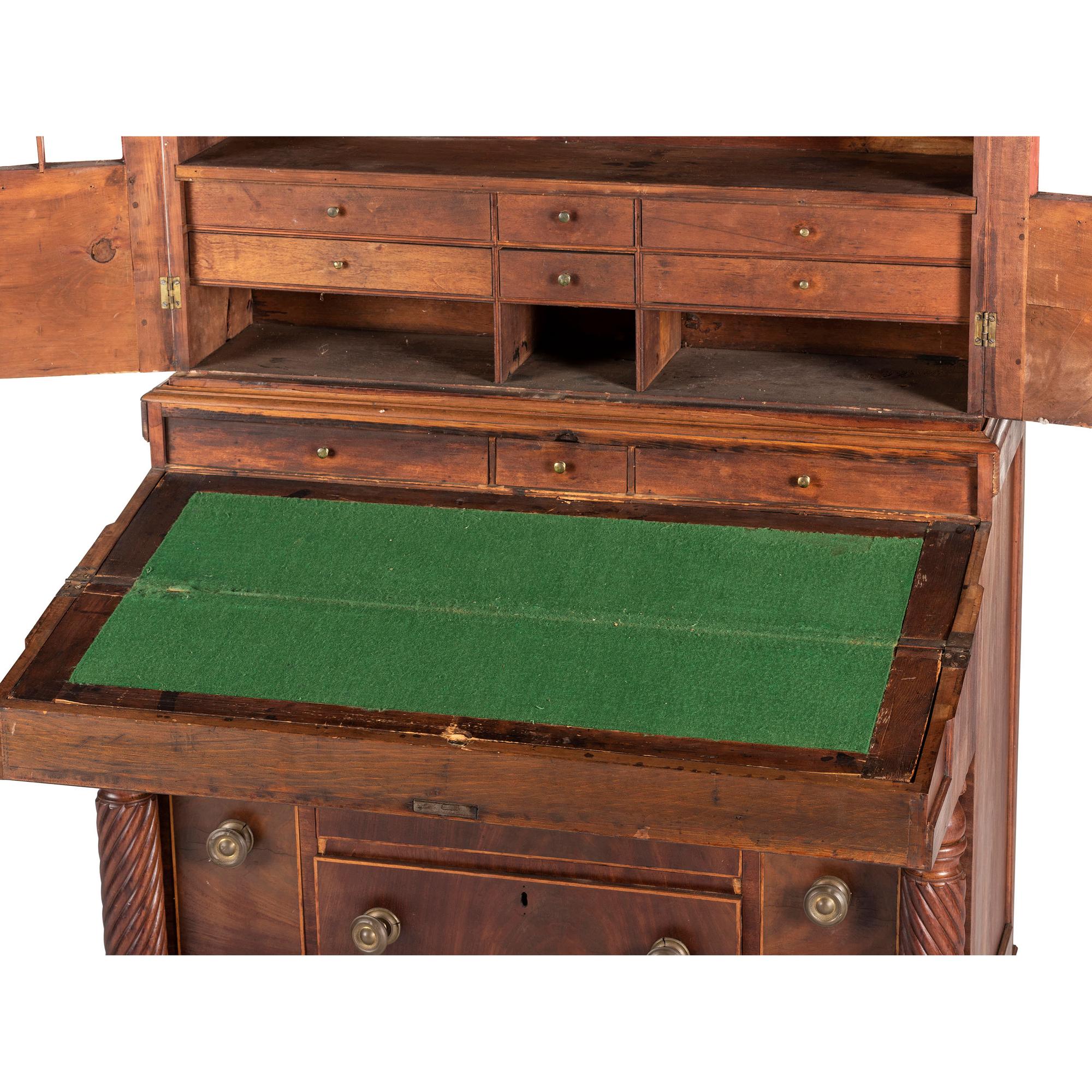 A Classical Figured Maple and Mahogany Desk-and-Bookcase