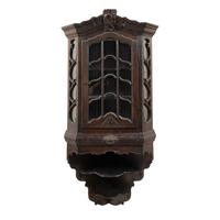 A Dutch Carved Oak Corner Cabinet