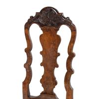 A Set of Three Dutch Carved Walnut Side Chairs
