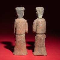 A Pair of Chinese Painted Grey Pottery Ladies with Owls, Han Dynasty — 漢 灰陶彩繪持鷹女俑一對