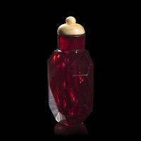An Imperial Ruby-Red Glass Faceted Snuff Bottle, Attributed to the Palace Workshops, Beijing, 1730-1770