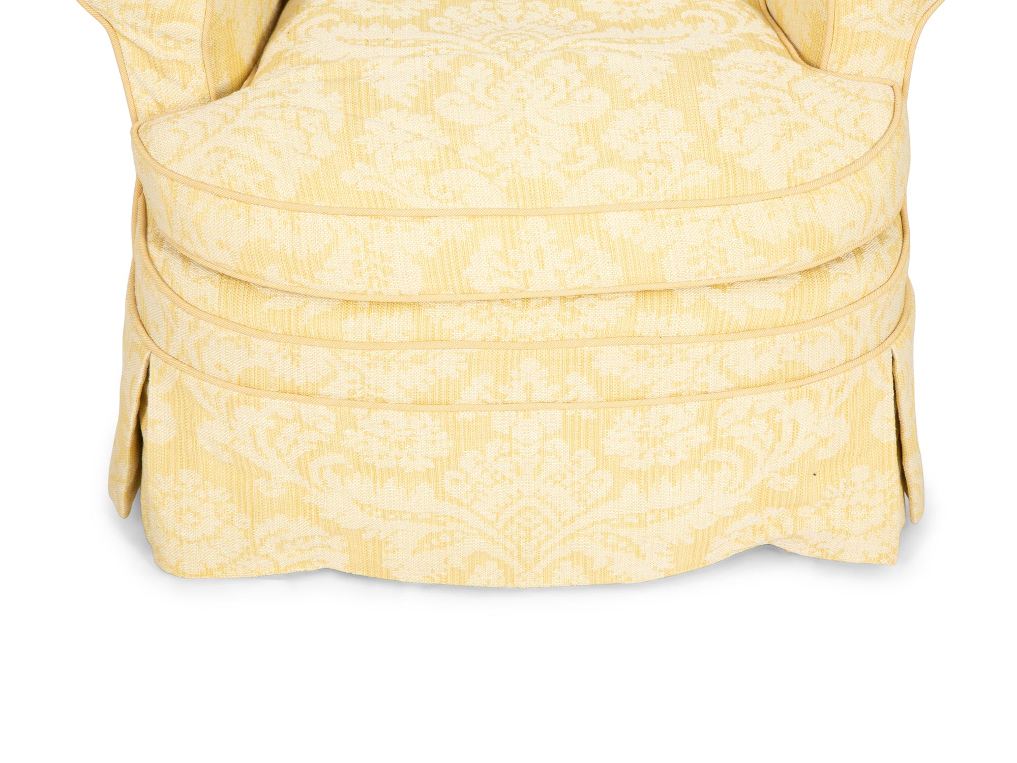 A Yellow Cotton-Slip Covered Club Chair