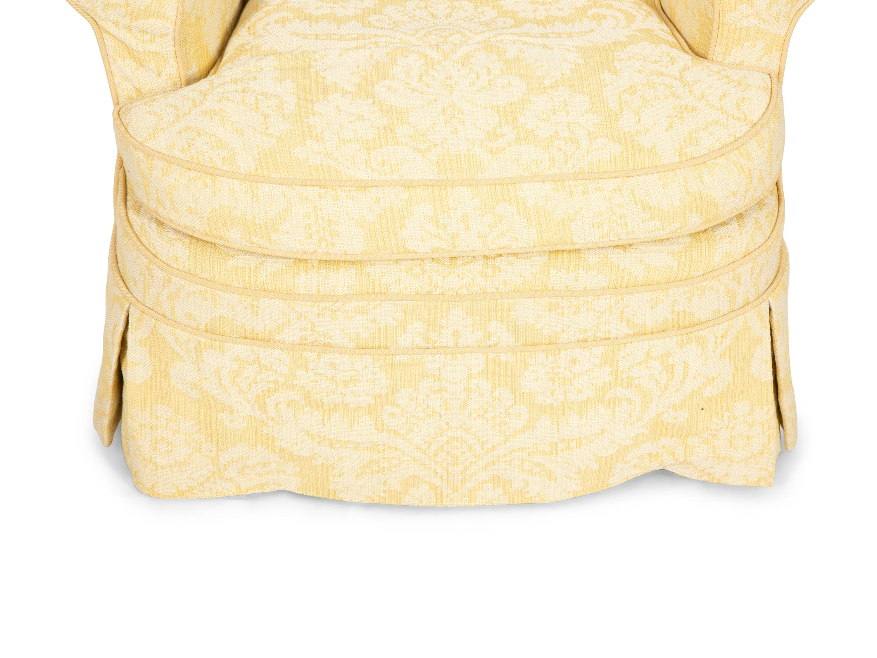 A Yellow Cotton-Slip Covered Club Chair