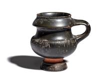 An Apulian Black-Glazed Oinochoe