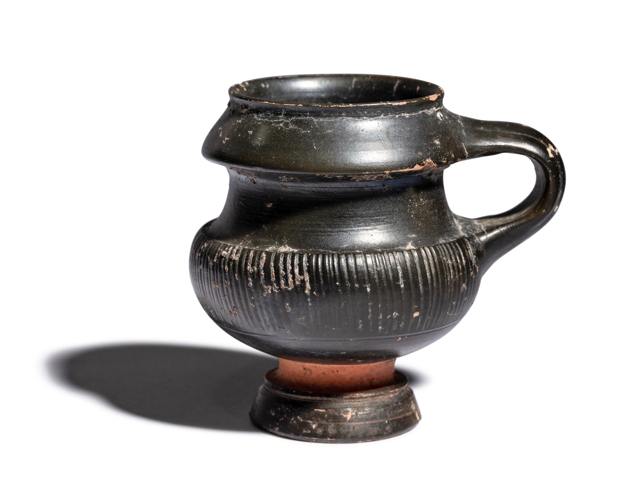 An Apulian Black-Glazed Oinochoe