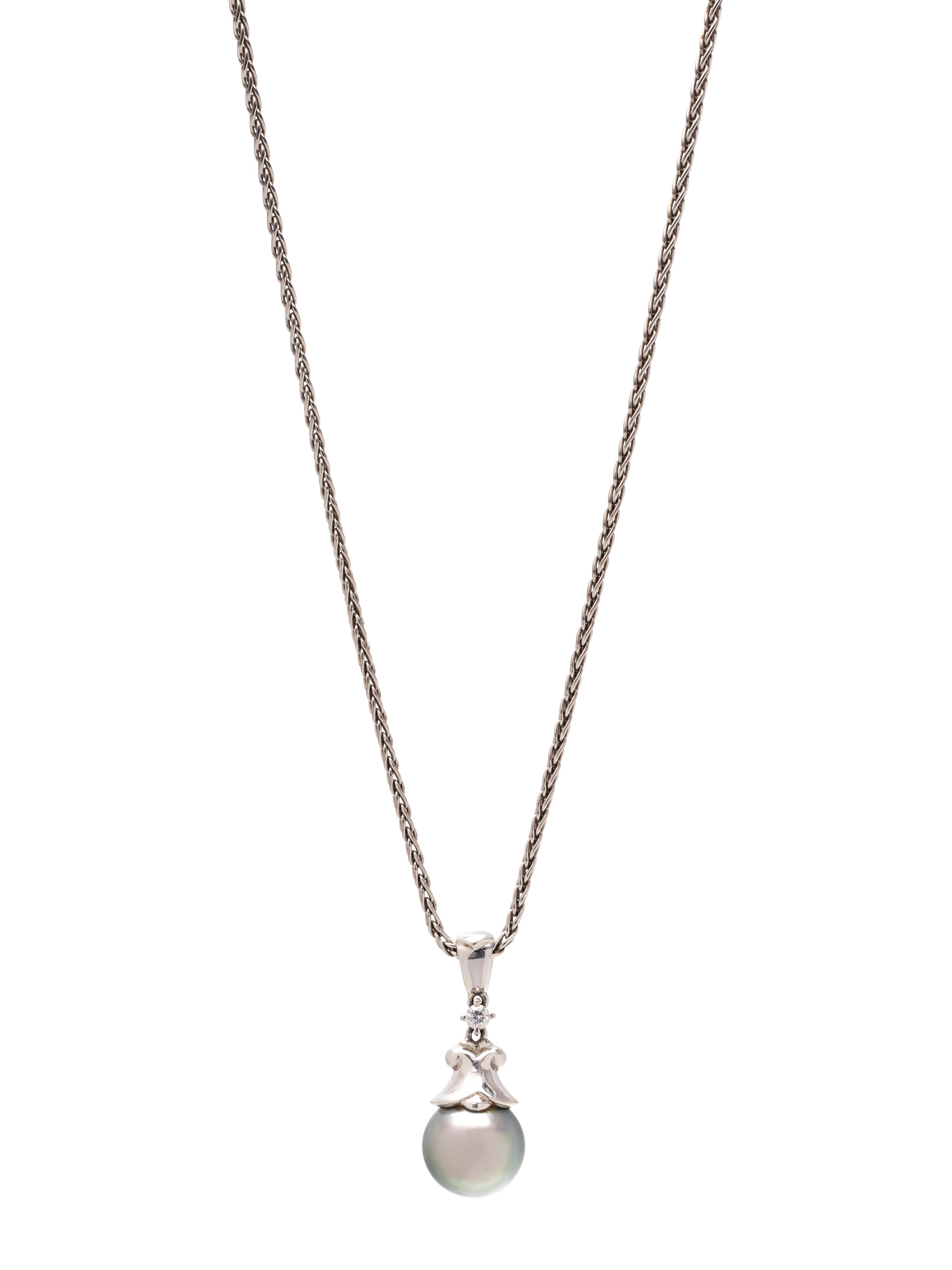 MIKIMOTO, CULTURED TAHITIAN PEARL AND DIAMOND PENDANT