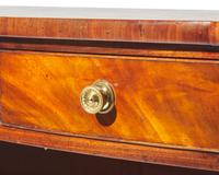 A small George III bowfront mahogany bookcase, circa 1800