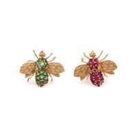COLLECTION OF YELLOW GOLD AND GEMSTONE BEE BROOCHES