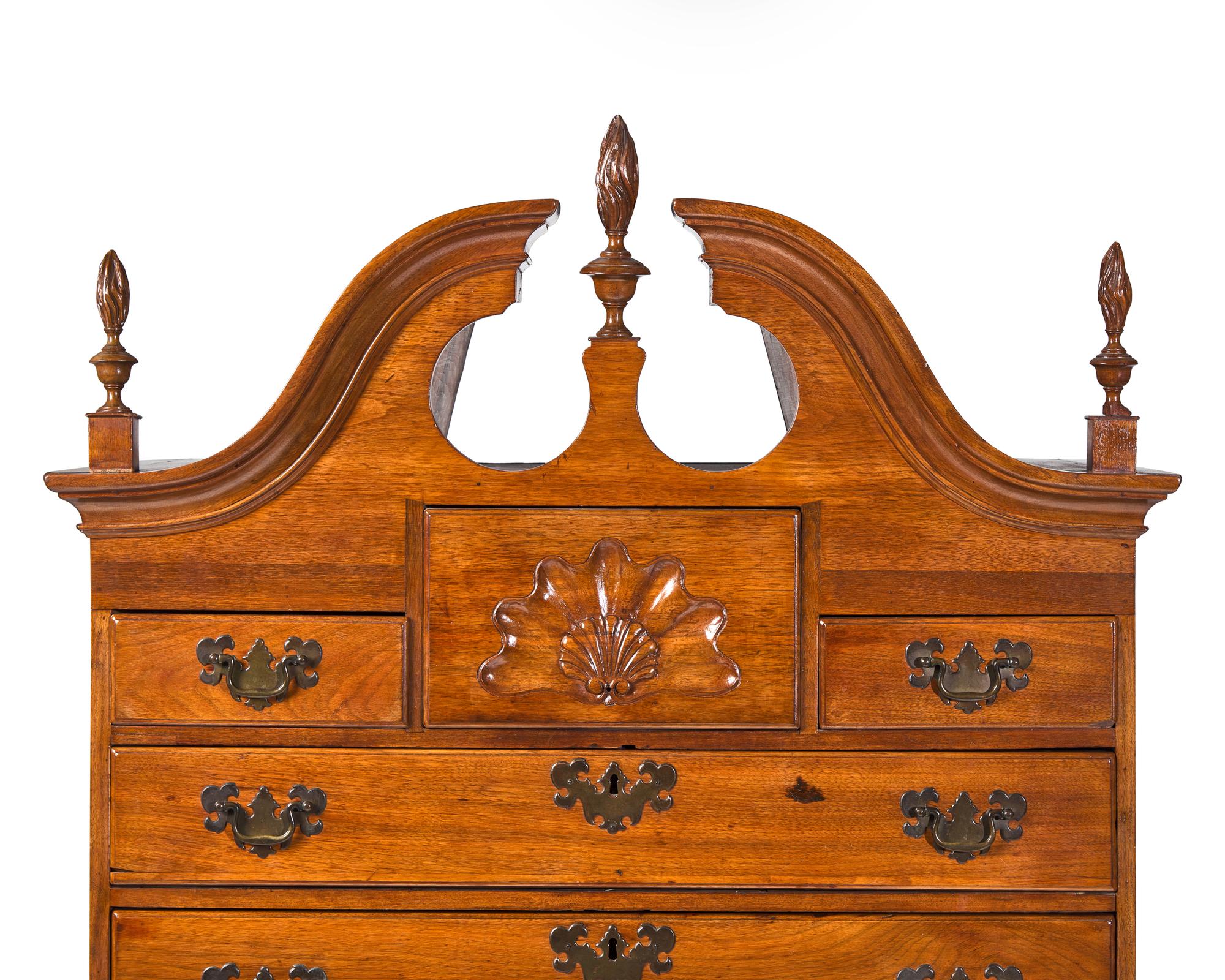 A Queen Anne Carved Walnut High Chest Of Drawers