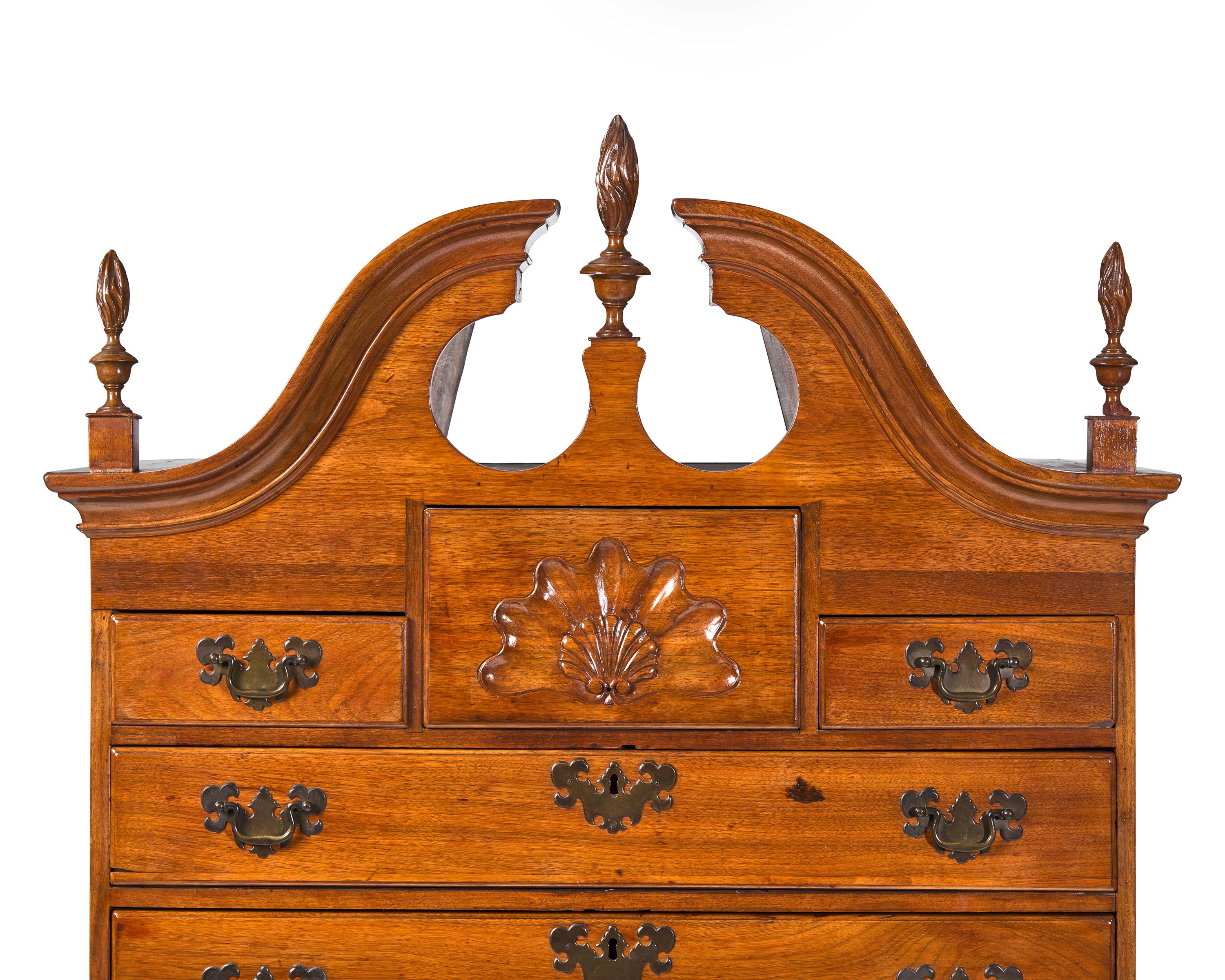 A Queen Anne Carved Walnut High Chest Of Drawers