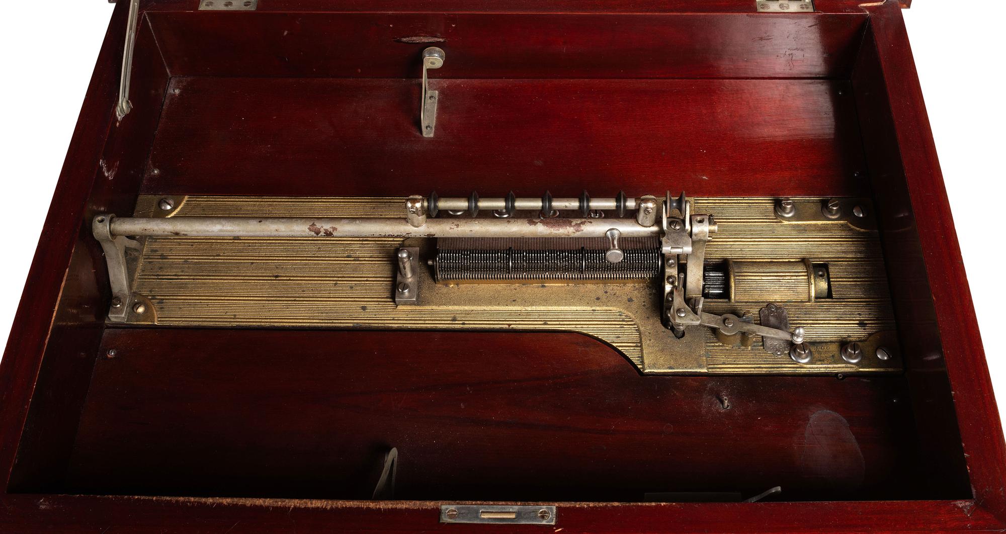 A Mira Mahogany-Cased Disc Music Box and Cabinet