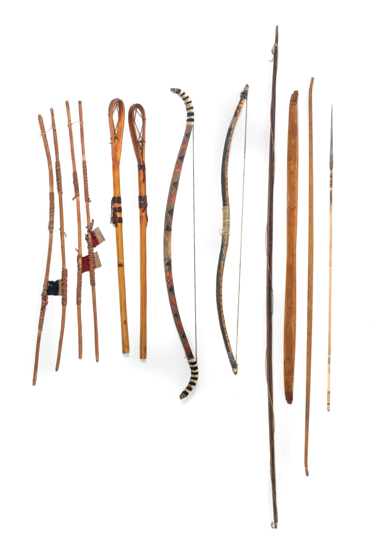 A Group of Southwest Style Hunting Tools and Games Length of longest 75 inches.