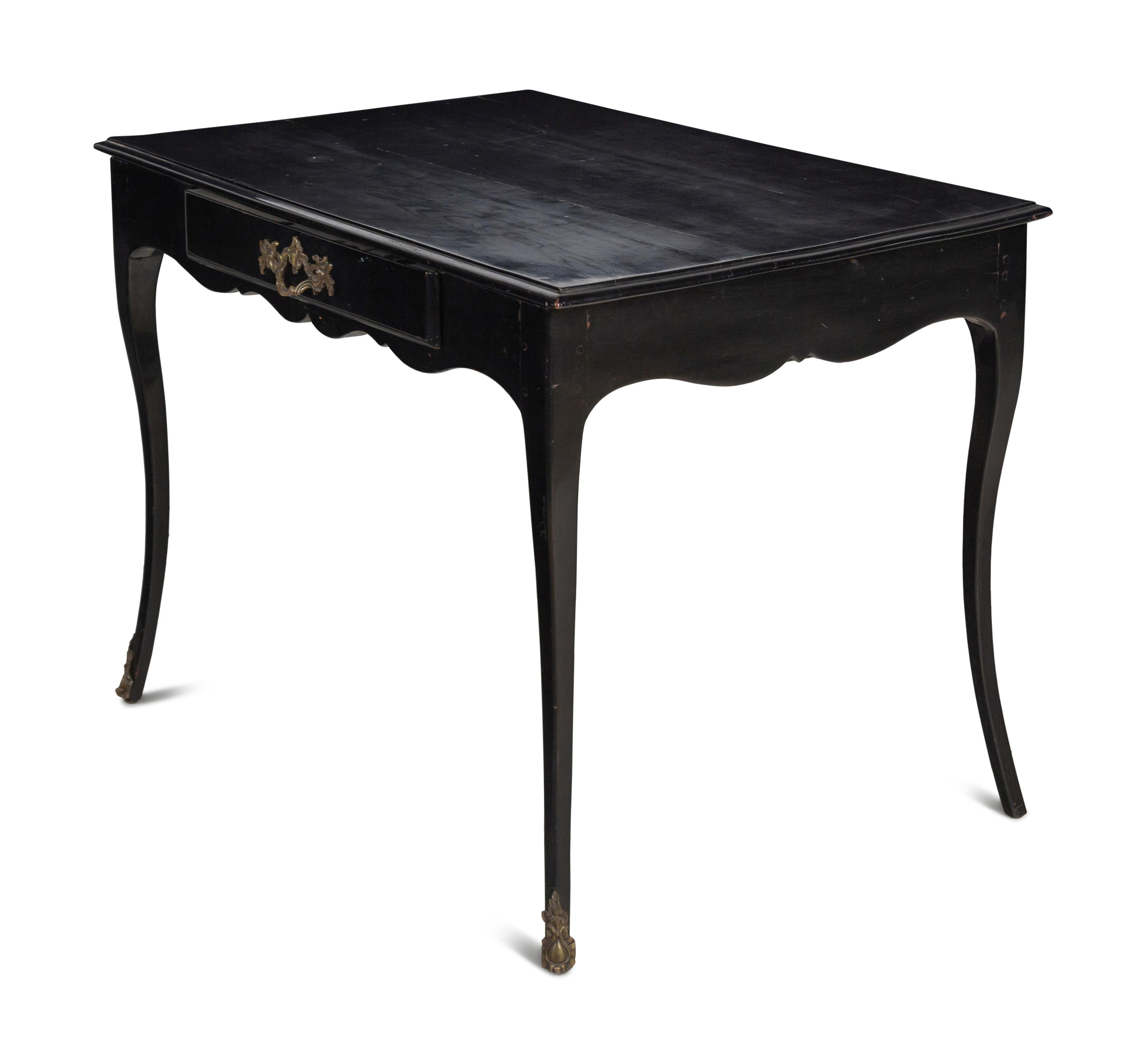 A Régence Gilt Bronze Mounted Ebonized Writing Table