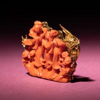 A Chinese Carved Red Coral ‘ Meiren" Brooch, 20th Century — 近代 金鑲珊瑚鏤雕仕女圖胸針