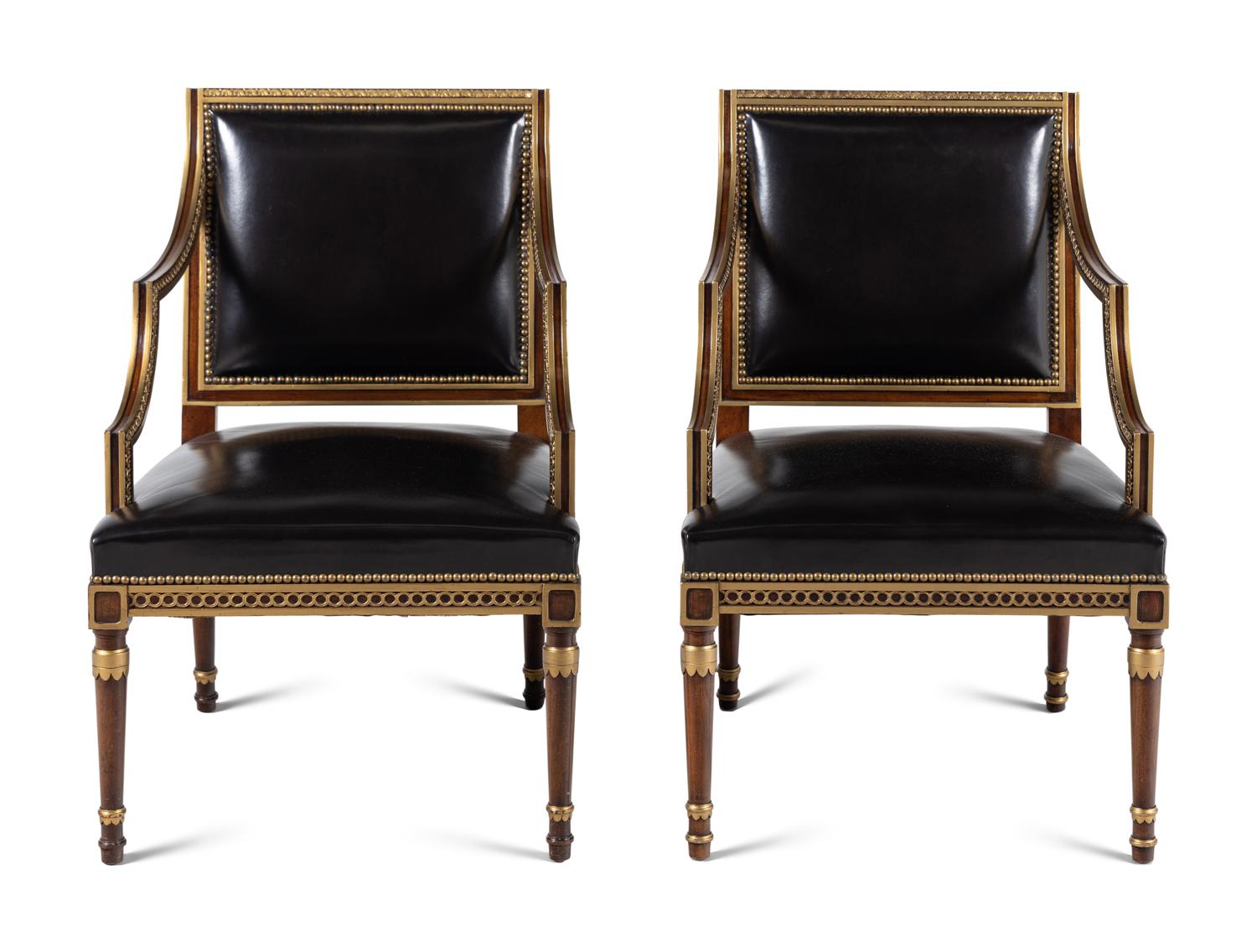 A Pair of Neoclassical Style Parcel Gilt Mahogany Armchairs