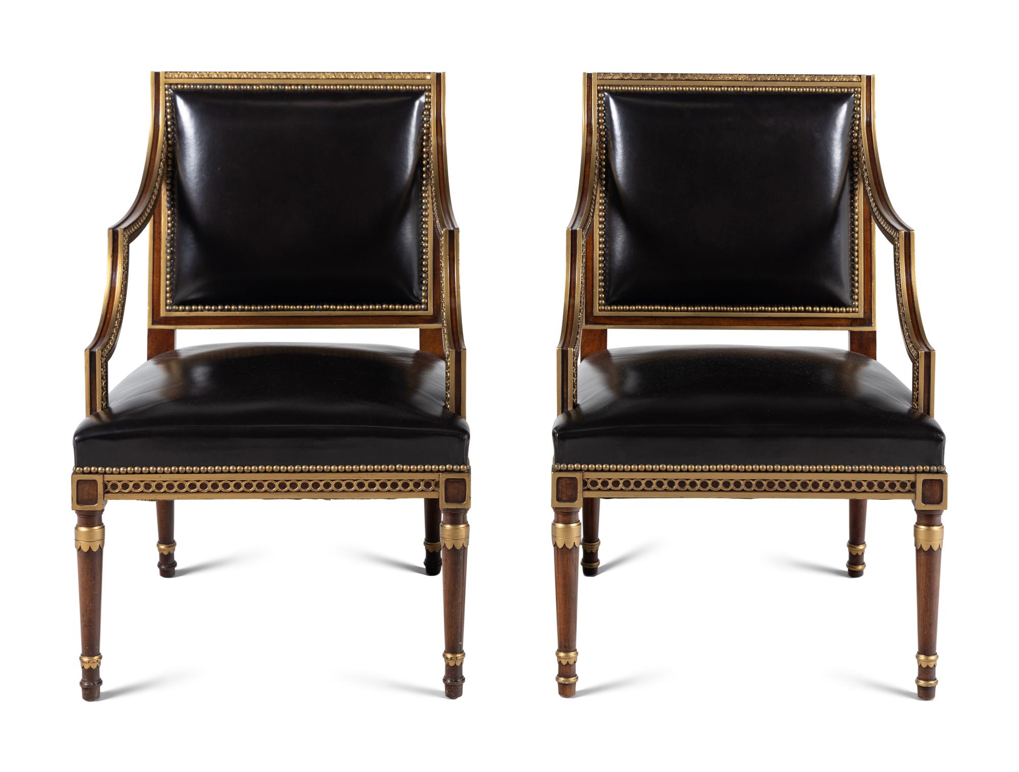 A Pair of Neoclassical Style Parcel Gilt Mahogany Armchairs