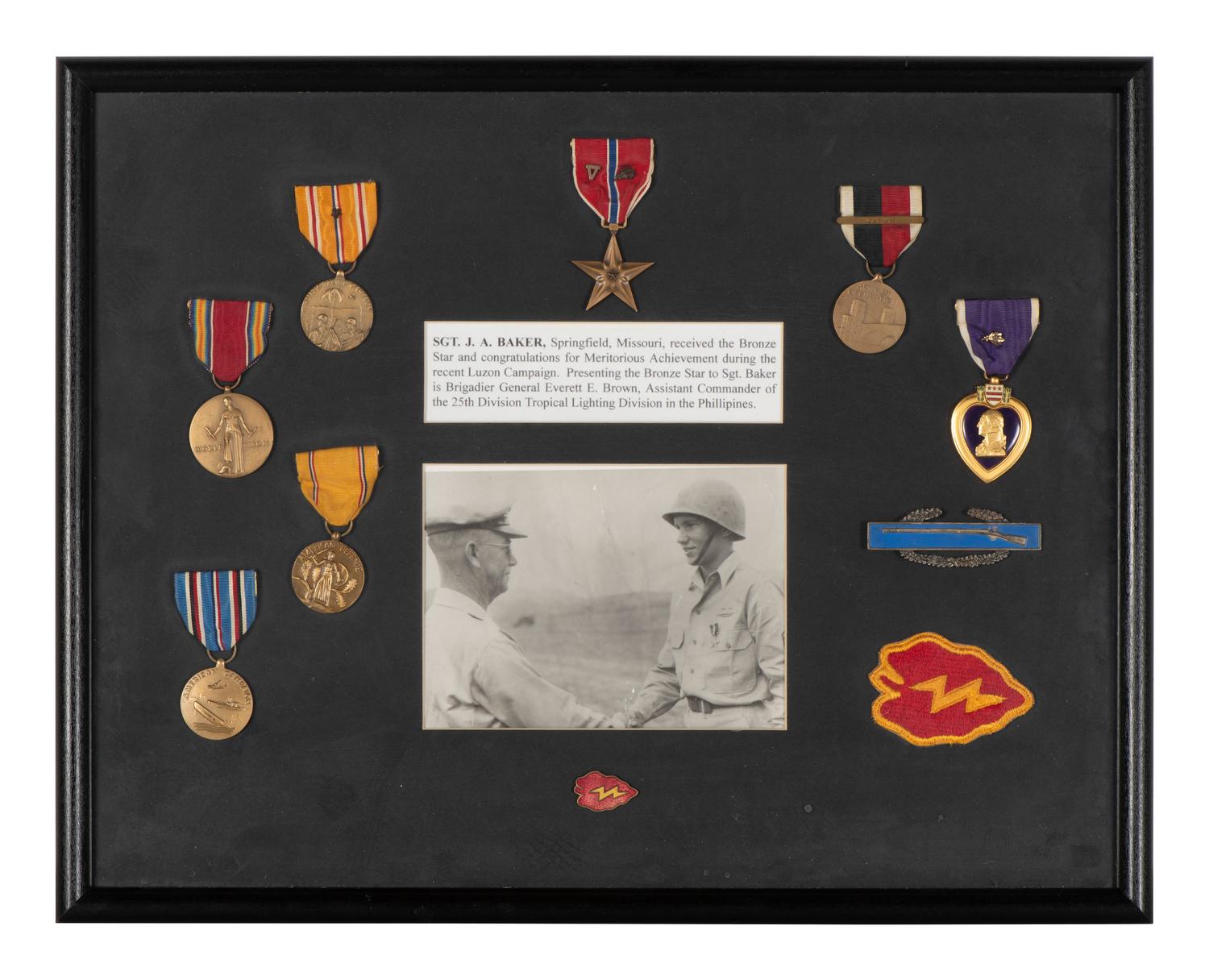 [WORLD WAR II]. Two framed displays featuring medals and patches of identified soldiers.